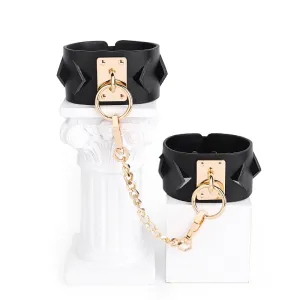 Chic Black Leather Restraint Set with Gold Accents and Diamond Cutouts