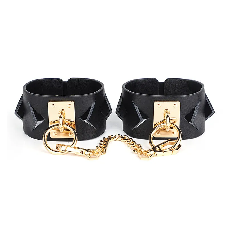 Chic Black Leather Restraint Set with Gold Accents and Diamond Cutouts