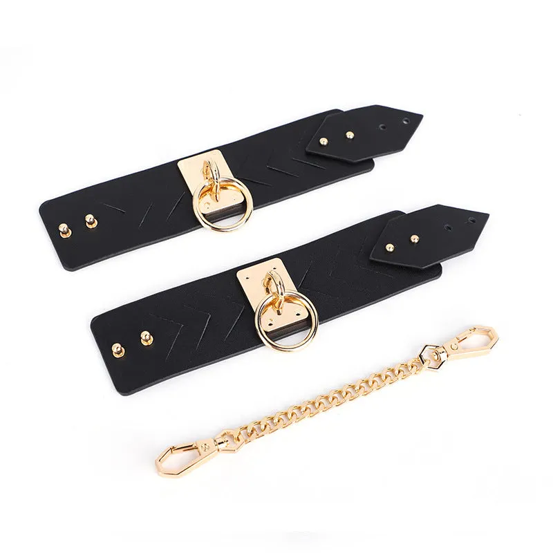 Chic Black Leather Restraint Set with Gold Accents and Diamond Cutouts
