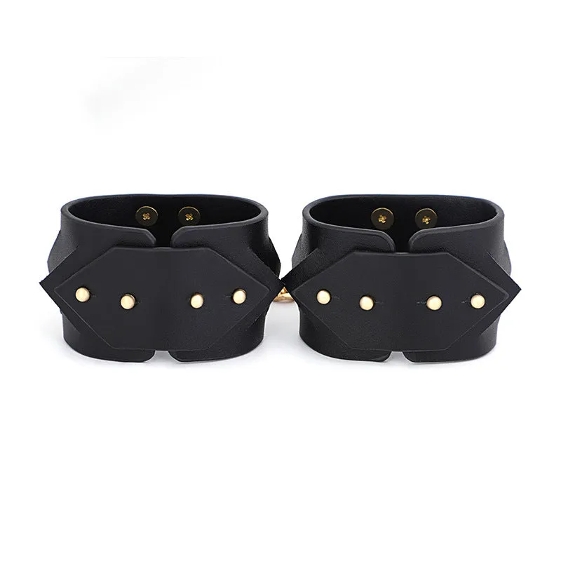 Chic Black Leather Restraint Set with Gold Accents and Diamond Cutouts