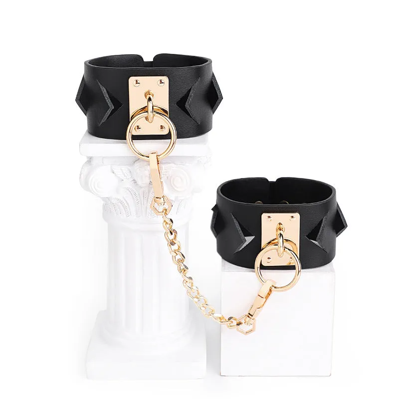 Chic Black Leather Restraint Set with Gold Accents and Diamond Cutouts