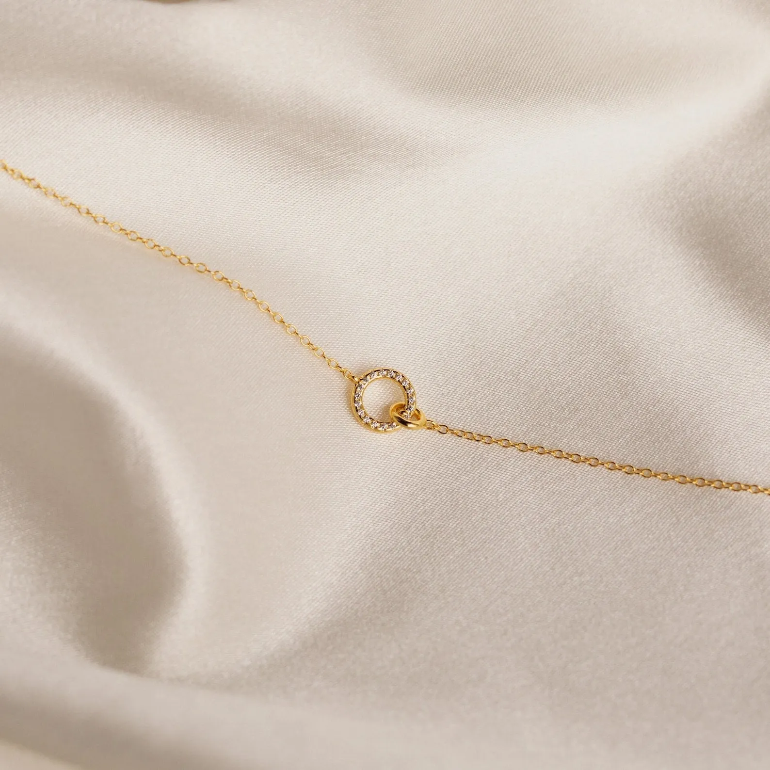 Elegant Interlocking Charm Necklace