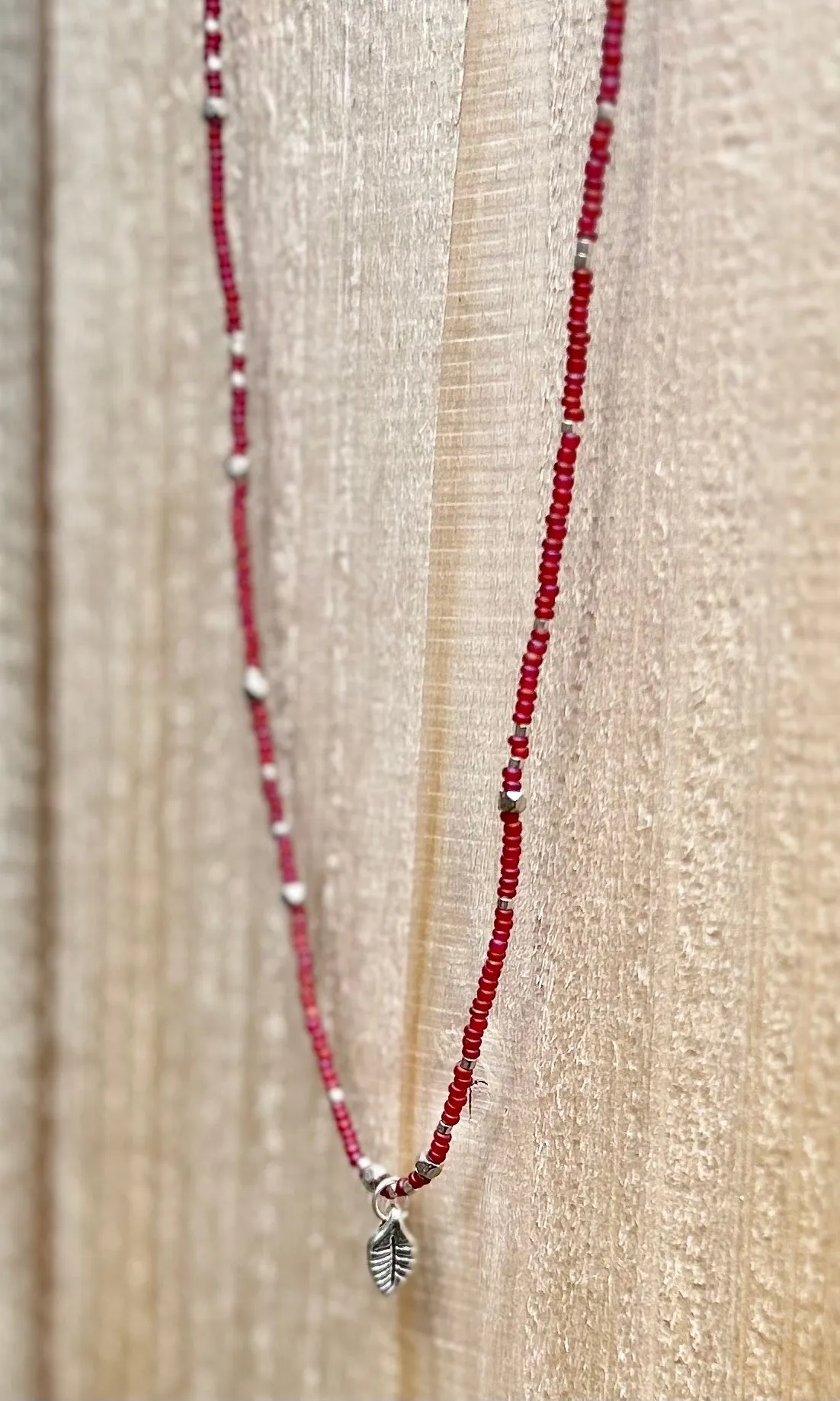 Magenta Seed Bead Boho Necklace with Silver Leaf Charm