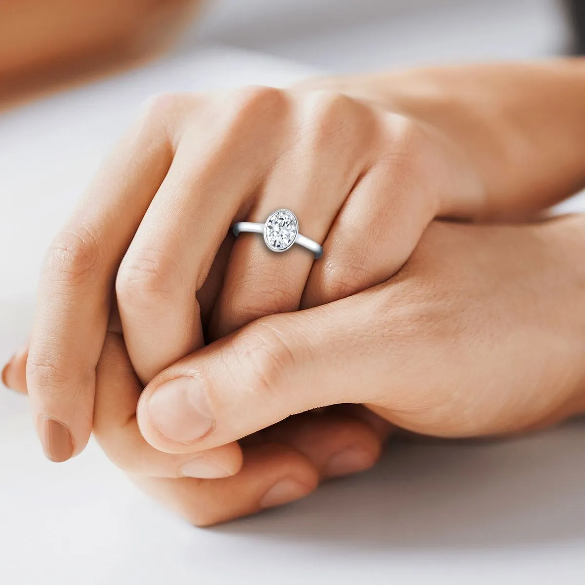 Platinum Oval Peridot Simple Bezel Solitaire Engagement Ring