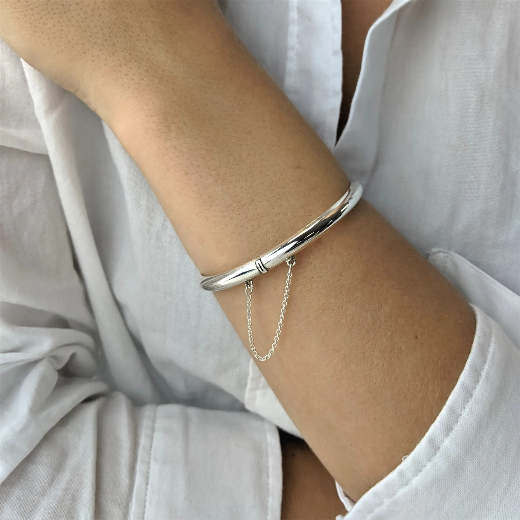 Sterling Silver Classic Hinged Bangle With Safety Chain - D-Shaped Design